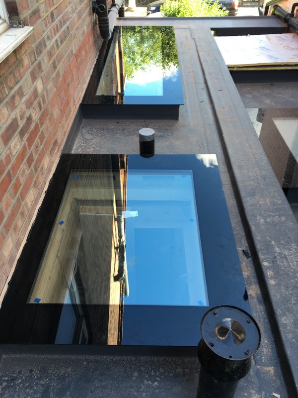 Multiple flat roof skylights on extension in Beaconsfield